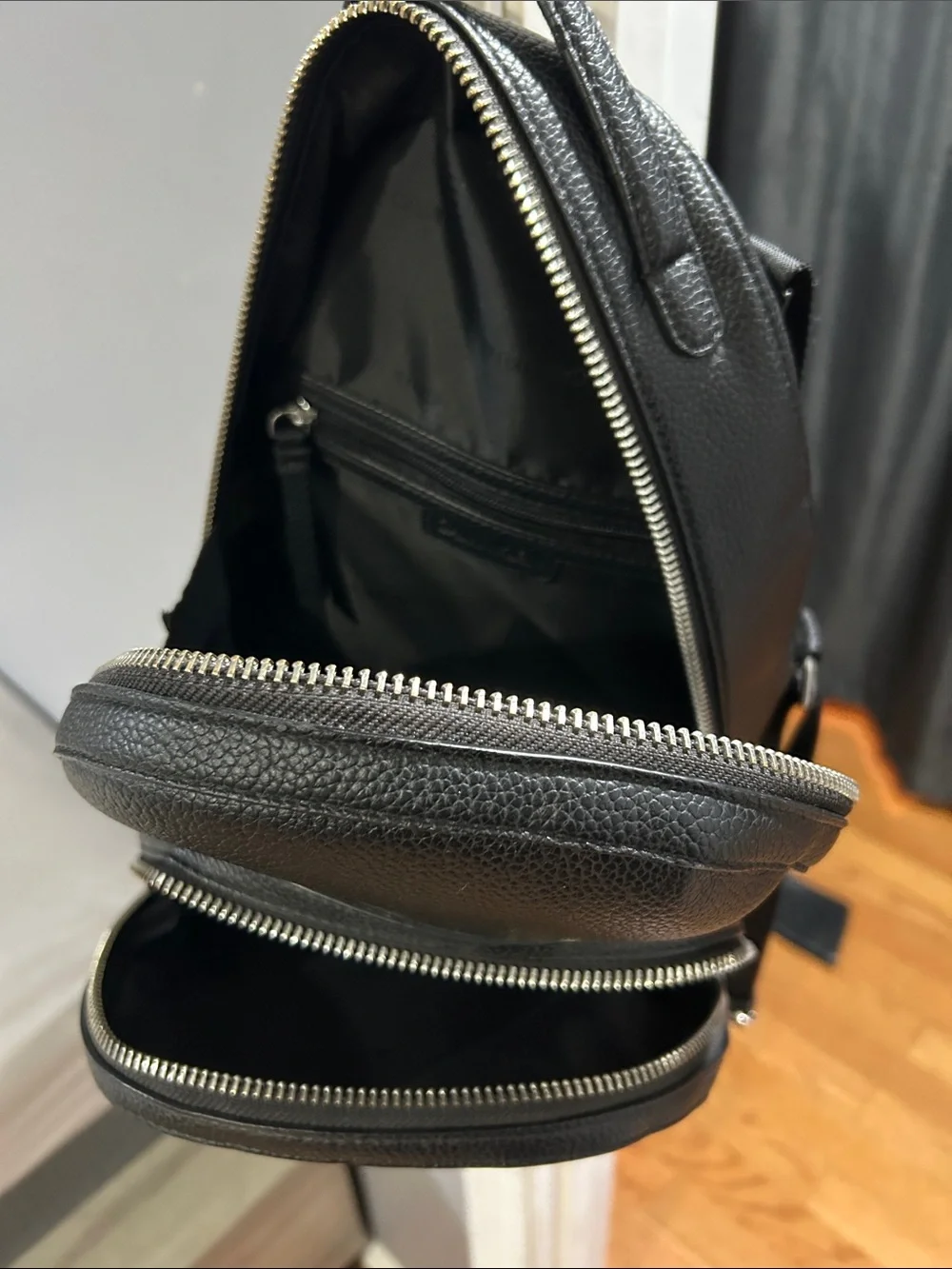 Calvin Klein Black Pebbled Leather Mini Backpack with Front Zip Pocket